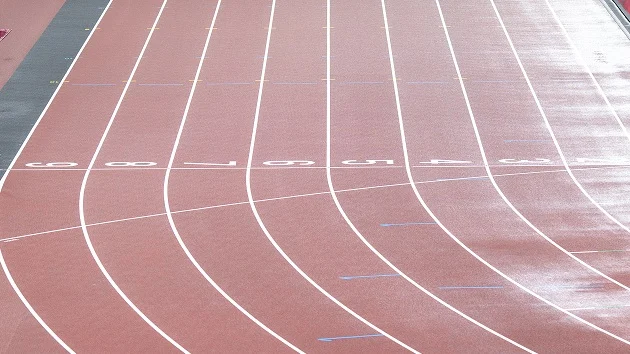 Family threatens legal action after track star is disqualified over celebration paying homage to Olympian