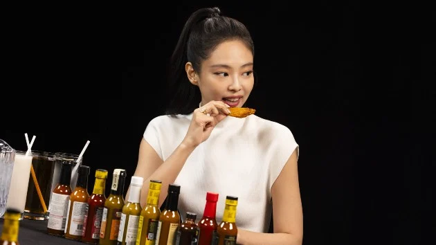 JENNIE faces the heat on Hot Ones