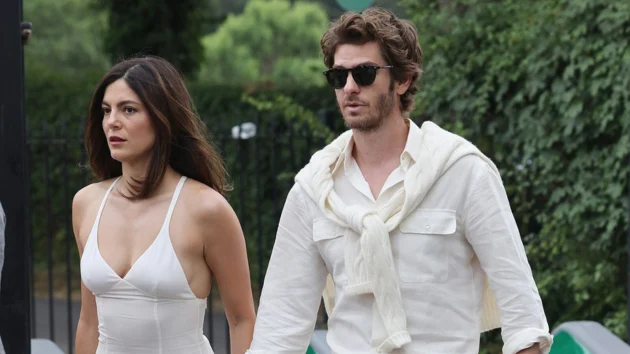Monica Barbaro and Andrew Garfield share moment at Wimbledon in matching white