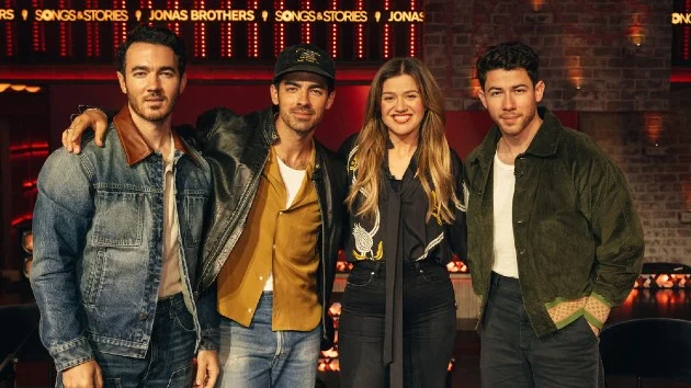 Watch Kelly Clarkson sing ‘Year 3000’ with Jonas Brothers in interview series preview