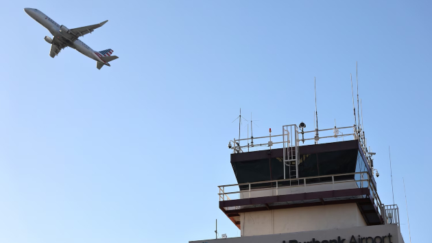 Air traffic controllers working without pay begin to call out sick, leading to flight cancellations and delays nationwide